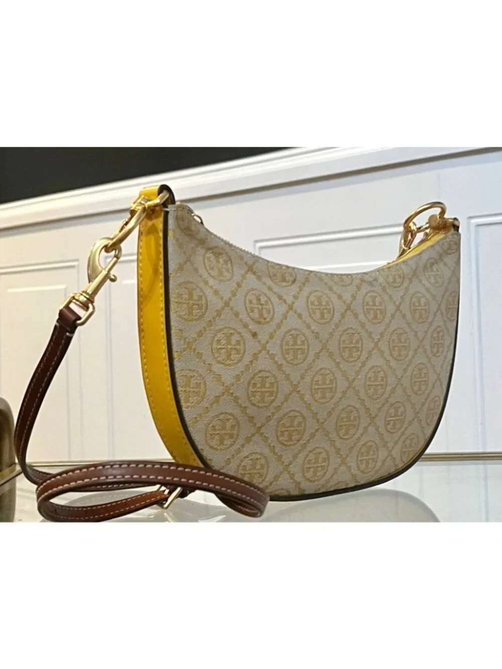 Tory Burch Monogram Half-Moon Crossbody Bag With Adjustable Strap In Yellow & Br